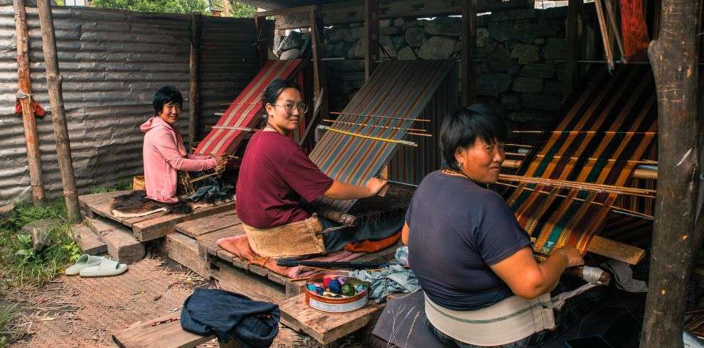 The women weaving in Khoma Village in Lhuntse Bhutan