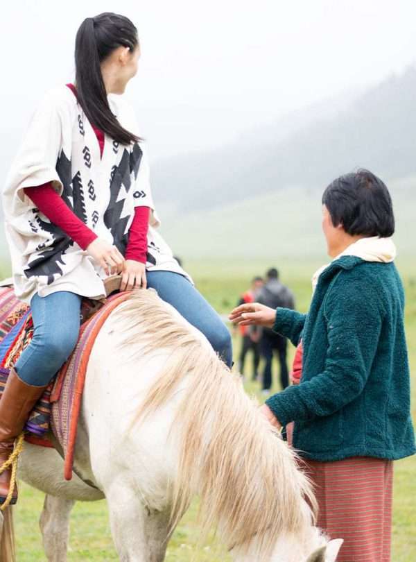 Horse riding at Phobjikha Valley in Bhutan